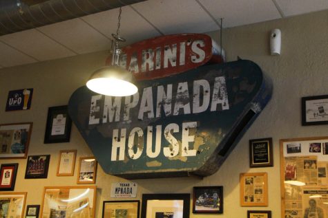 The bold sign is a reminder that Marini's is not in heaven. But that there can be heaven on Earth as well.