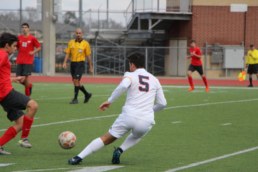 Felipe Latorre gets ready for a kick from an Memorial player.