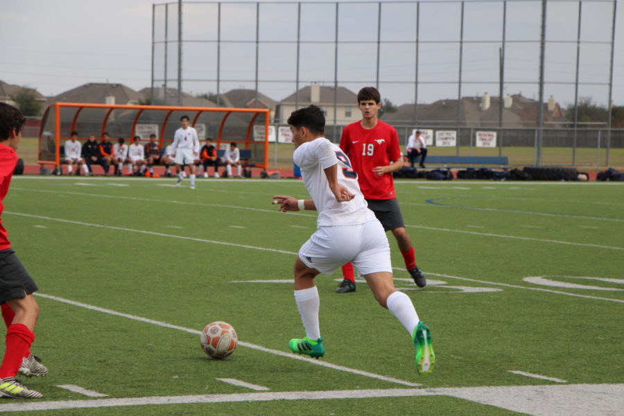 Raul Ekmeiro receives the ball and begins to make a play. 