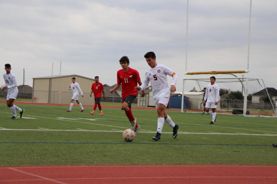 Felipe Latorre follows the ball as it moves out of bounds.
