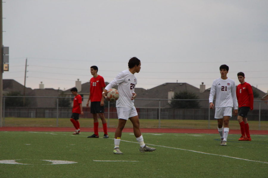 Tutu Hernandez holds the ball.