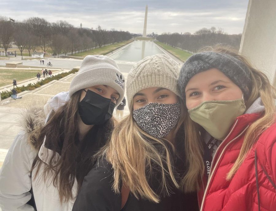 Students Carley Demerse, Carolina Rojas and Abigail Bradbury explore the Washington Monument and Lincoln Memorial