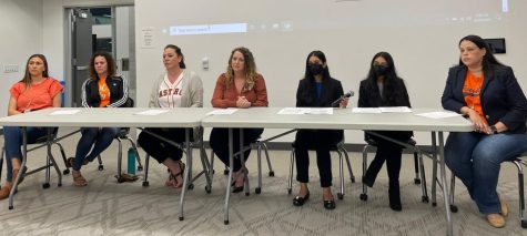 Nithya and Sriya Cheemalamarri speak on a district panel at Legacy Stadium alongside mental health and youth professionals to discuss cyberbullying and its impact on mental health.
