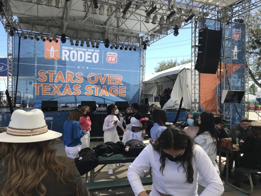 Karma Krew performers prepare to dance on the Stars Over Texas stage at the Houston Livestock Show and Rodeo. 