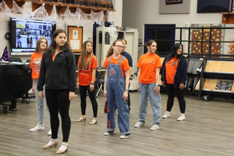 The Sensations women practice their choreography for their upcoming show.